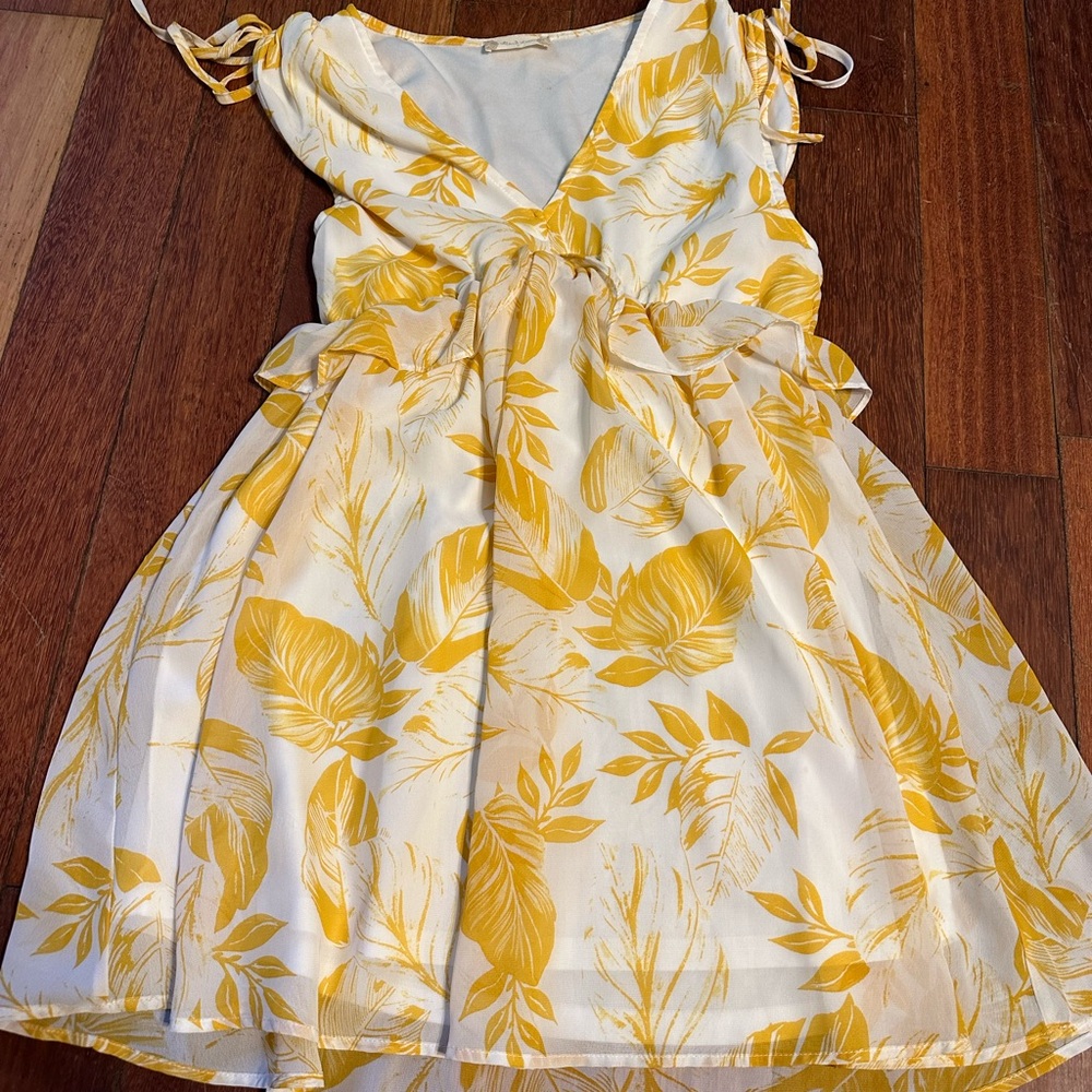 Altar’d State yellow and white tie shoulder above-the-knee sundress.